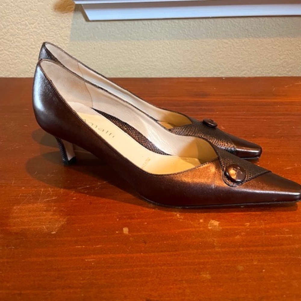 Brand new in box Almafi 2" pumps. Bronze in color in a size 6
